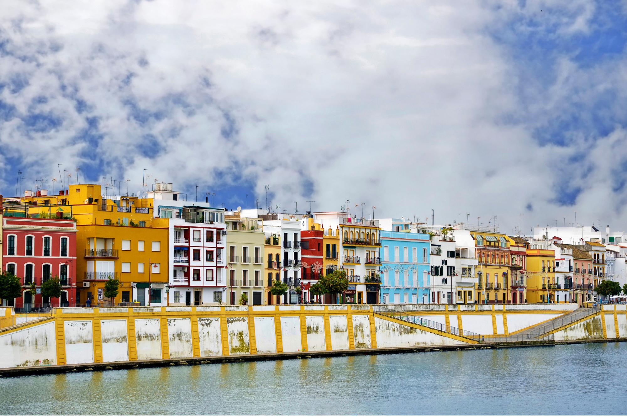 Panoramic image of Betis Street in Seville just behind the Guadalquivir River.